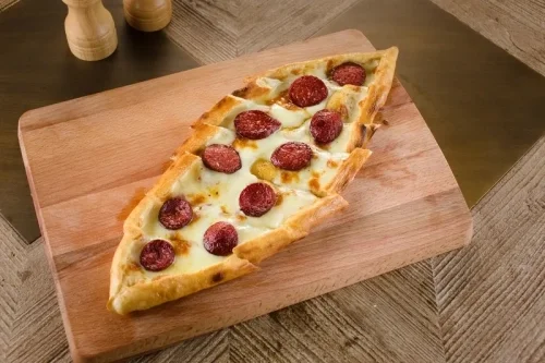 Pide with sucuk and kaşar cheese