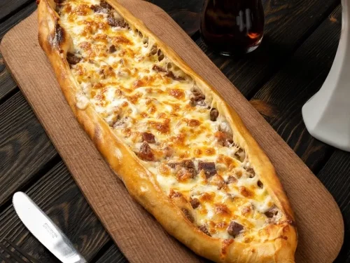 Pide with kavurma and kaşar cheese
